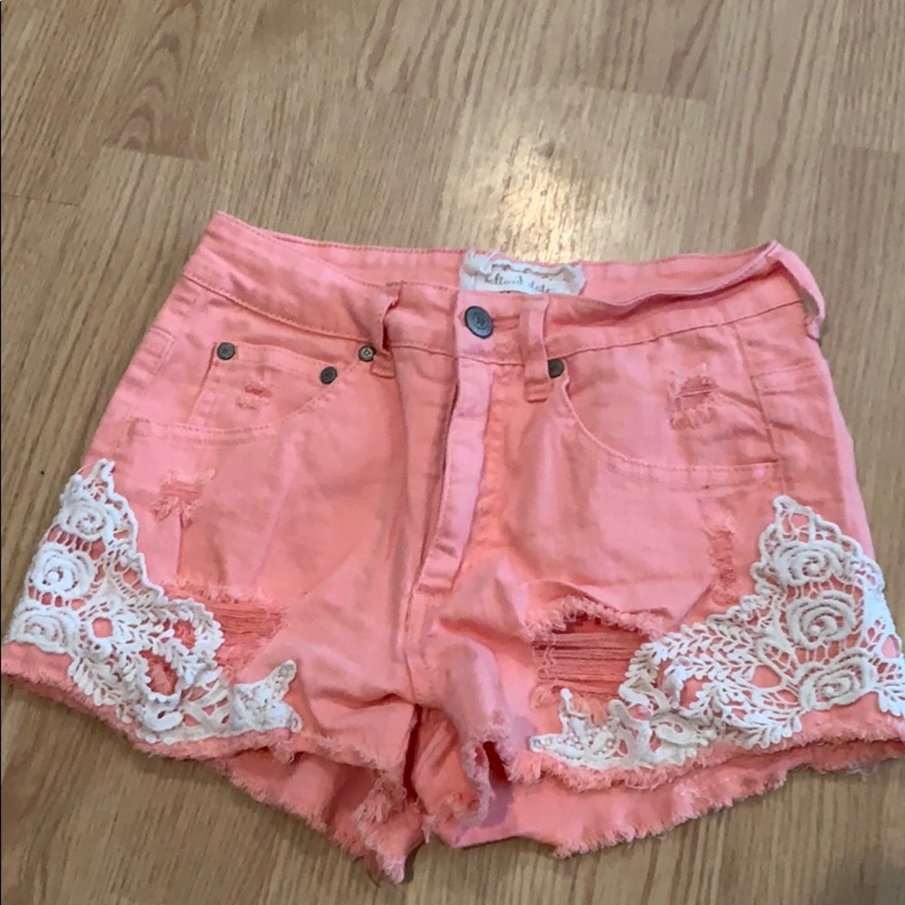 Alter’d State peach holey denim shorts with lace